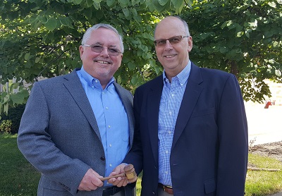 Bob Parish passed the RVIA chairman's gavel to incoming 2019 chairmen Gary Enyart