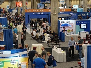 A photo of people milling around at booths at the NTP-Stag Expo 2020