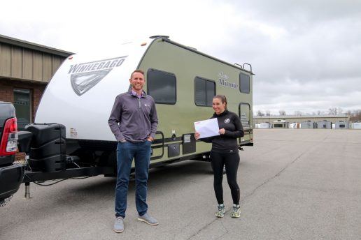A photo of Warrior Expeditions receiving a donated Winnebago RV